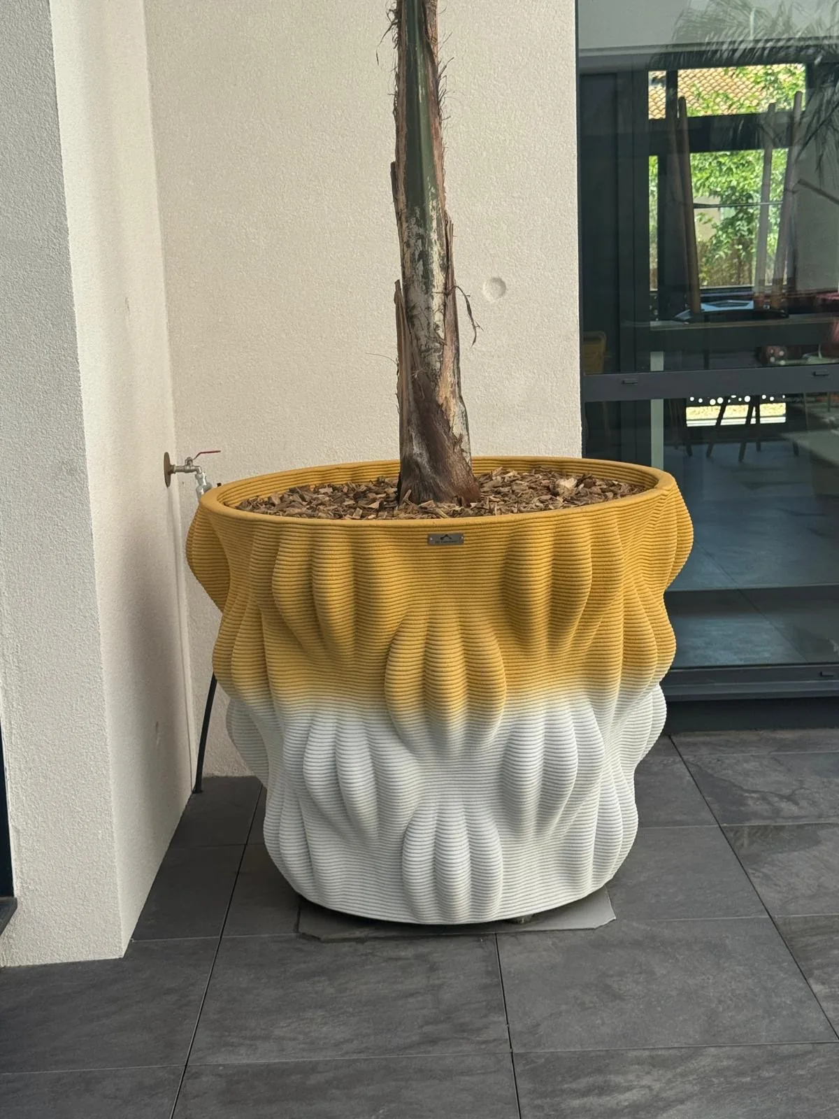 Two 3D concrete flower boxes